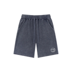 Asphalt blue snow wash shorts — front, tonal PM smiley patch on the hip