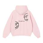 Baby pink graphic hoodie — back, two split half-smiley faces with a "picture me" script