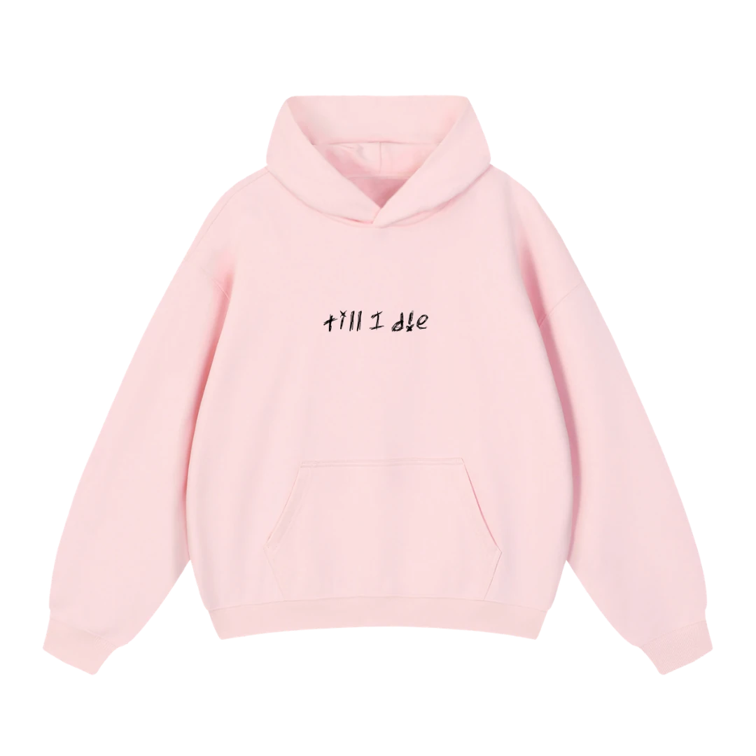 Baby pink graphic hoodie — front, tonal "till i die" script on the chest