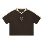 Brown waffle knit polo — front, cream tipped collar and shoulder trim
