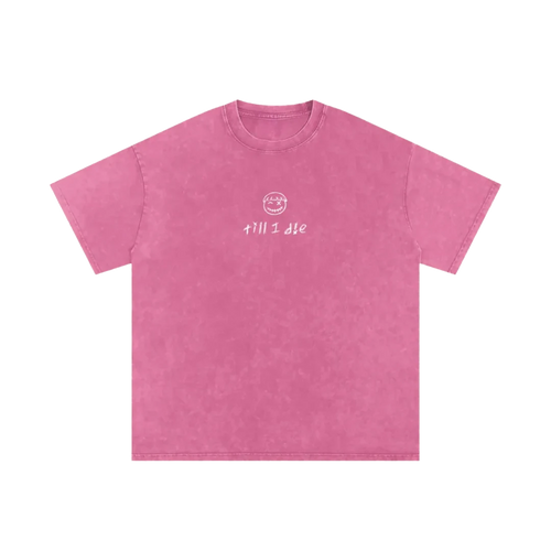Bubble gum pink final cut tee — front, PM smiley and "till i die" script on the chest