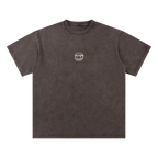 Coffee brown final cut tee — front, PM smiley framed in a small pink square on the chest