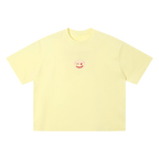 Lemon yellow drop shoulder tee — front, tonal PM smiley patch on the chest