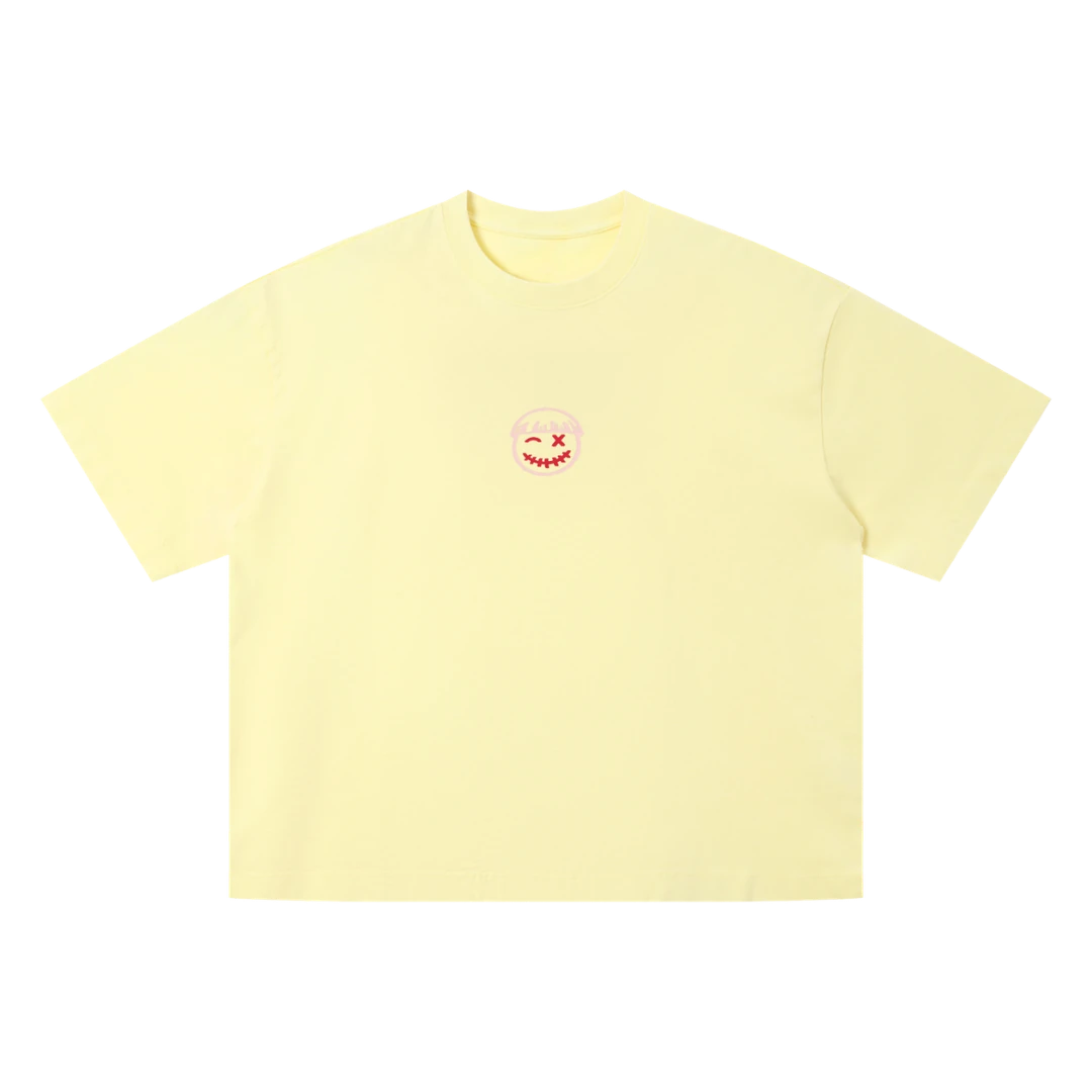 Lemon yellow drop shoulder tee — front, tonal PM smiley patch on the chest