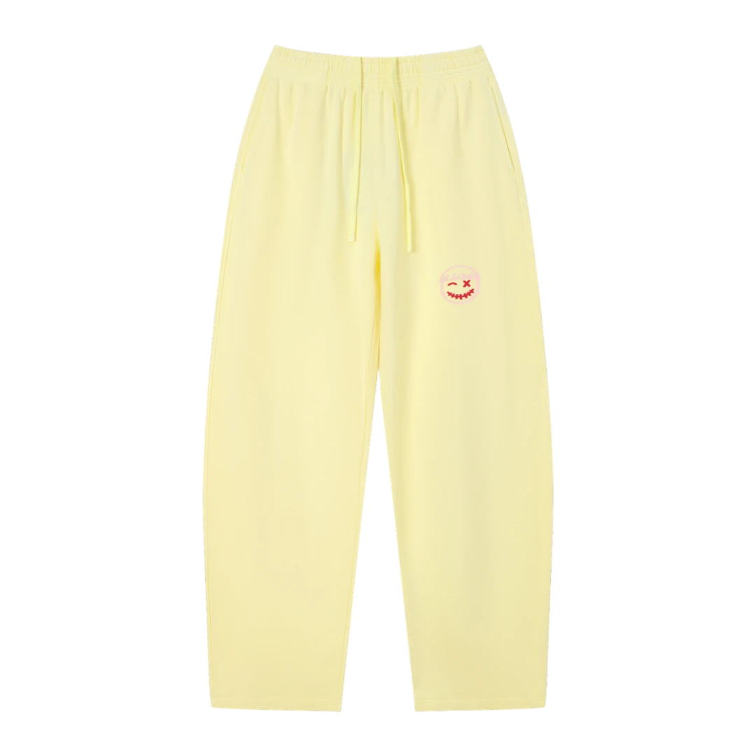 Lemon yellow wide-leg sweatpants — front, tonal PM smiley patch on the hip