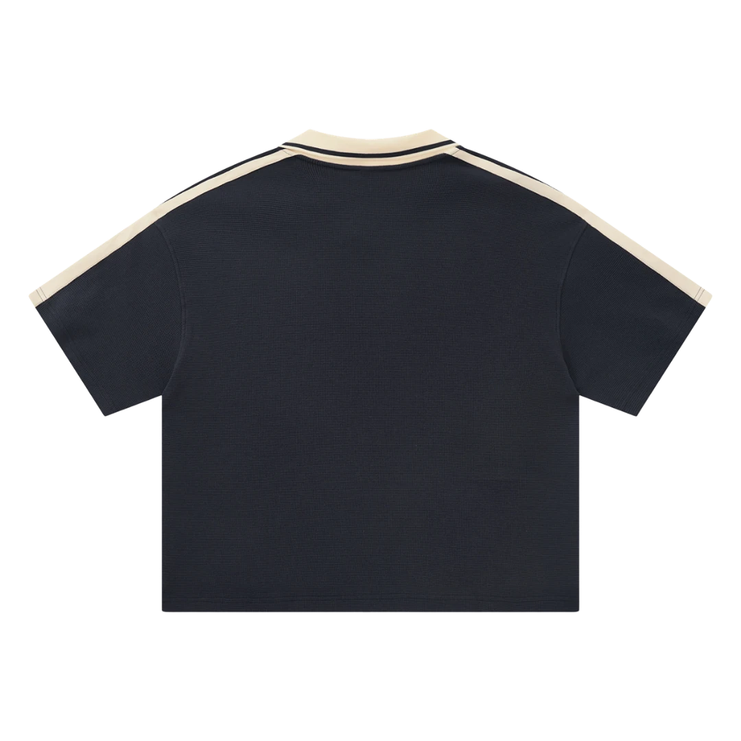 Navy waffle knit polo — back, plain back with matching trim