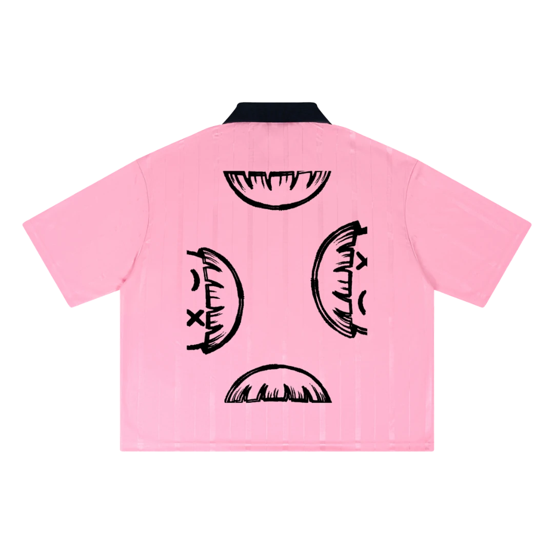 Pink soccer jersey — back, four half-smiley faces printed top, bottom, and both sides