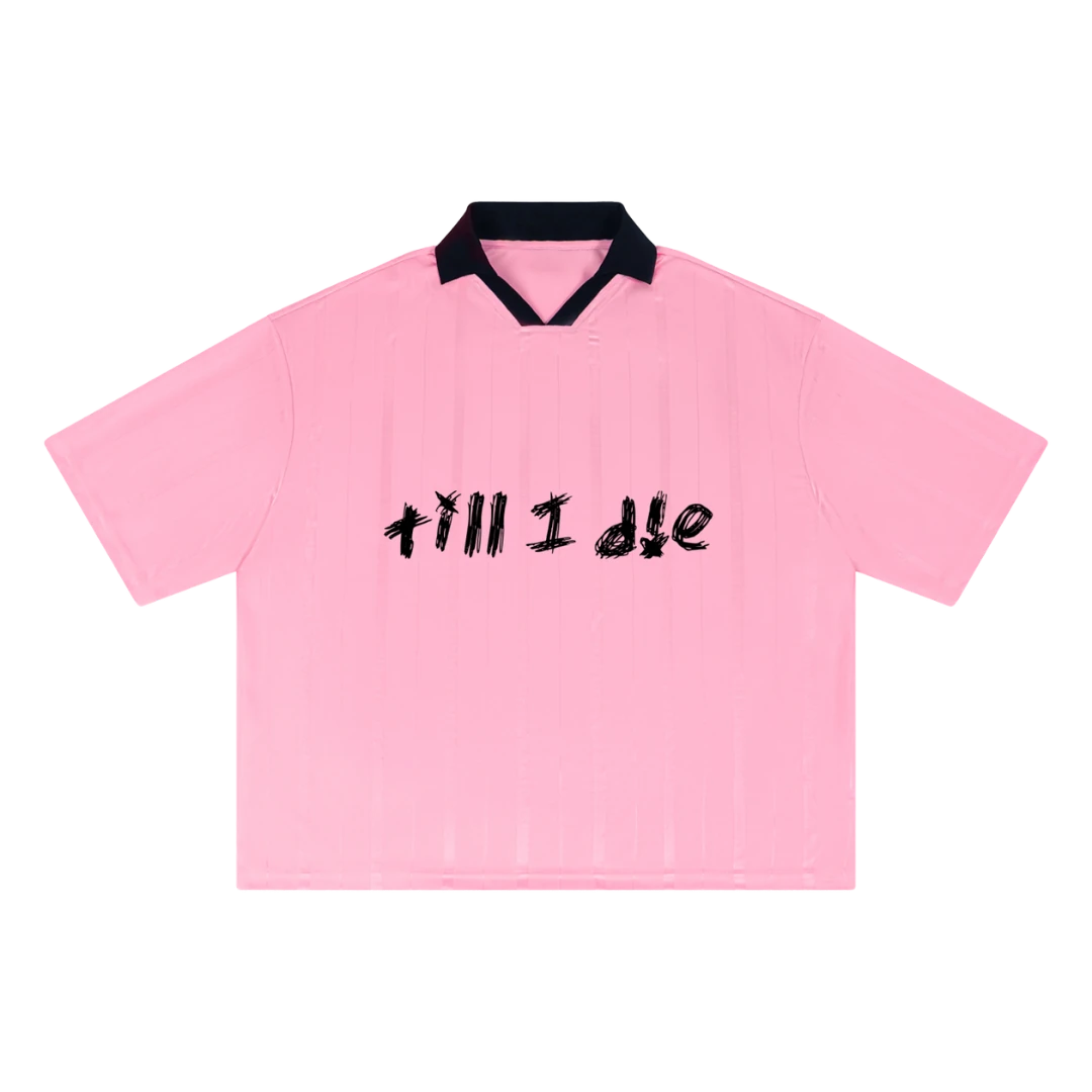 Pink soccer jersey — front, "till i die" script and navy V-collar