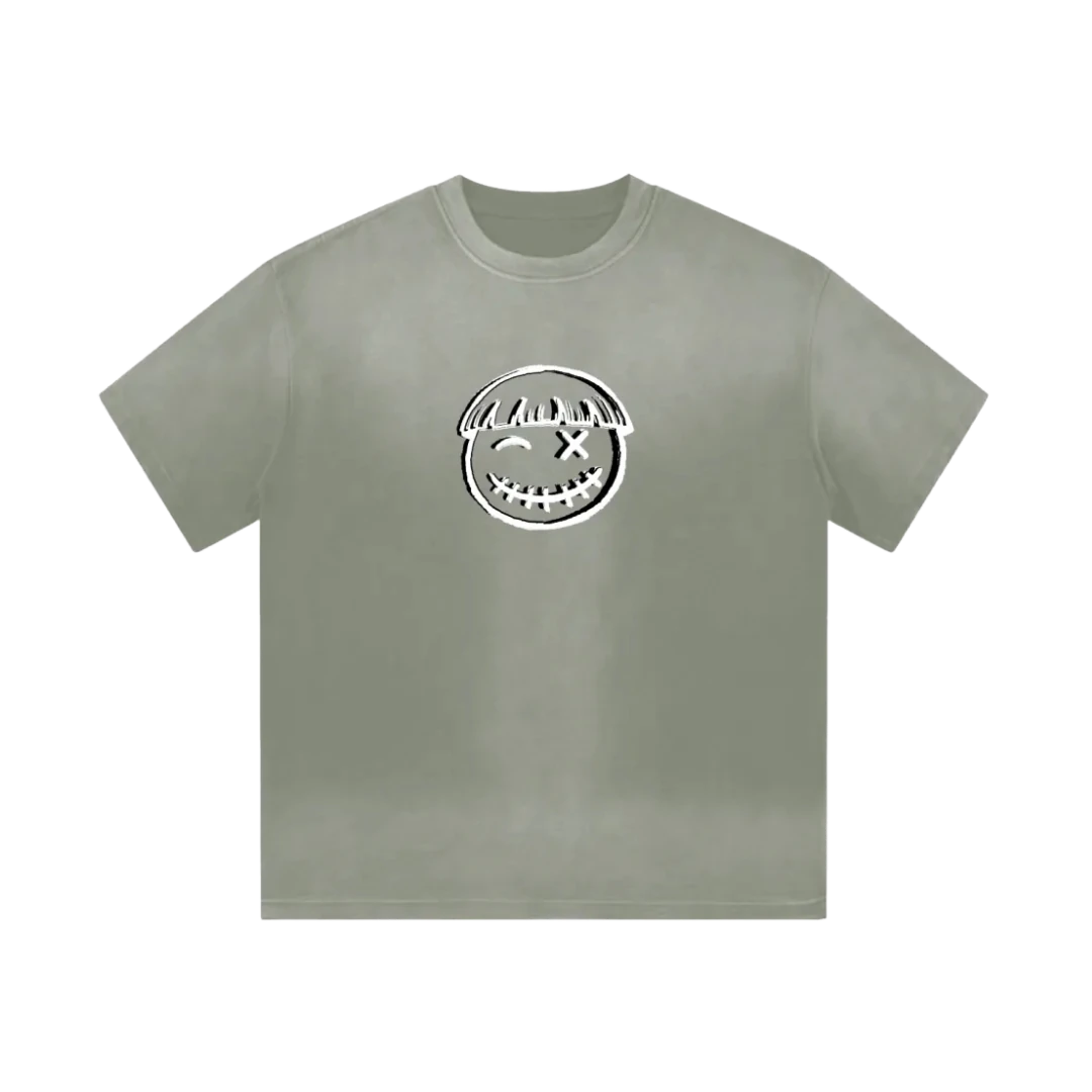 Pistachio green smiley tee — front, oversized PM smiley outline on the chest