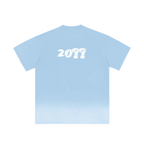 Sky blue ombre graphic tee — back, brand's tonal "20??" print