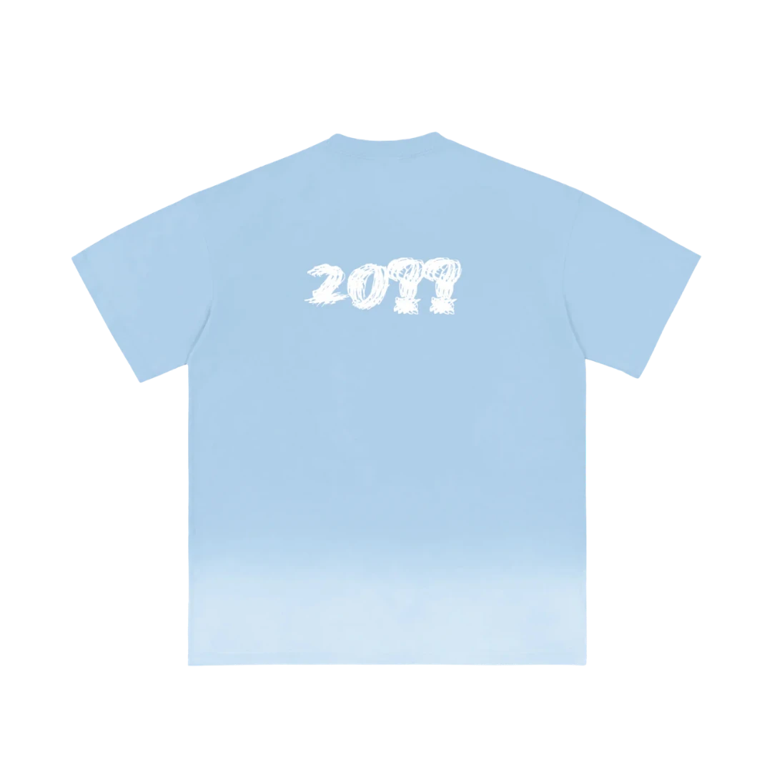 Sky blue ombre graphic tee — back, brand's tonal "20??" print