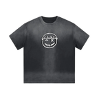Storm black smiley tee — front, oversized PM smiley outline on the chest